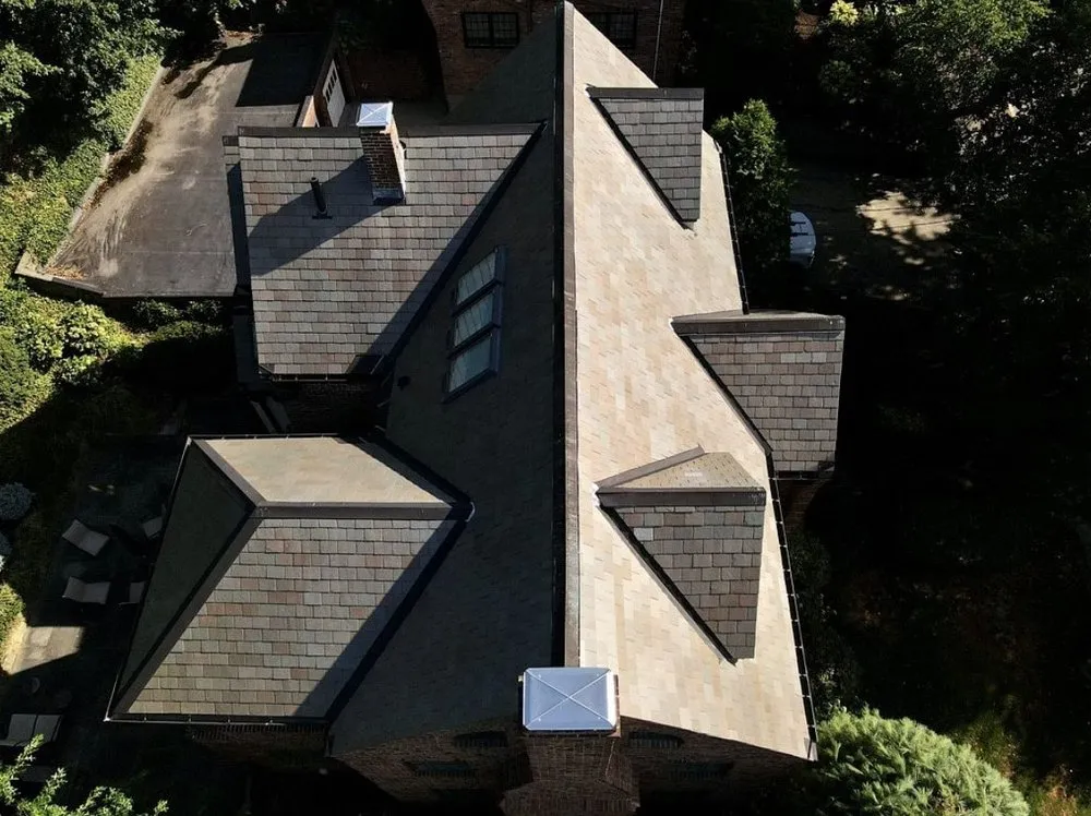 Slide of REI Roofing