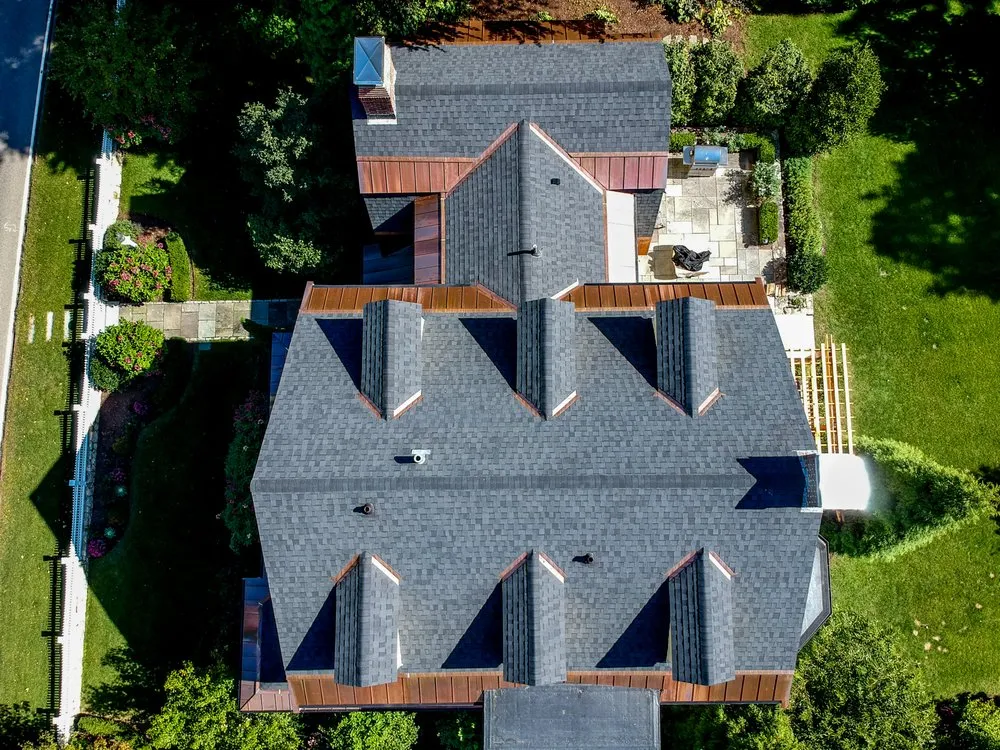 Slide of REI Roofing