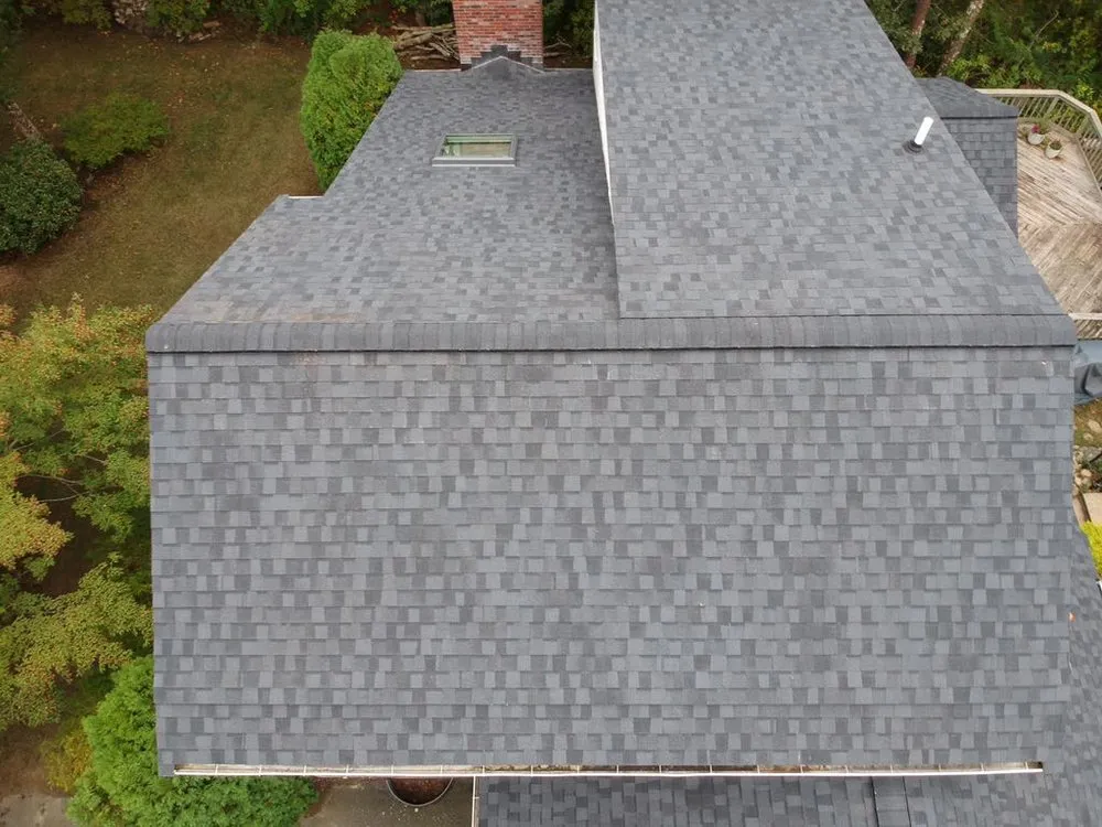 Slide of REI Roofing