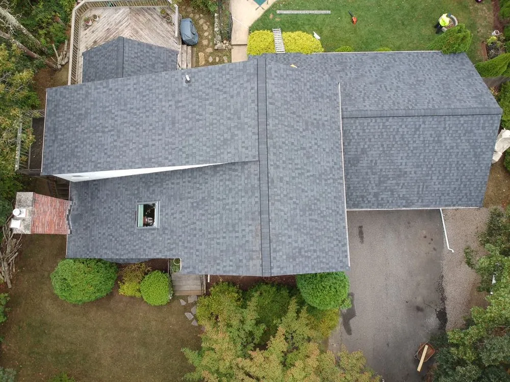 Slide of REI Roofing