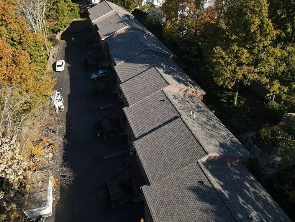 Slide of REI Roofing