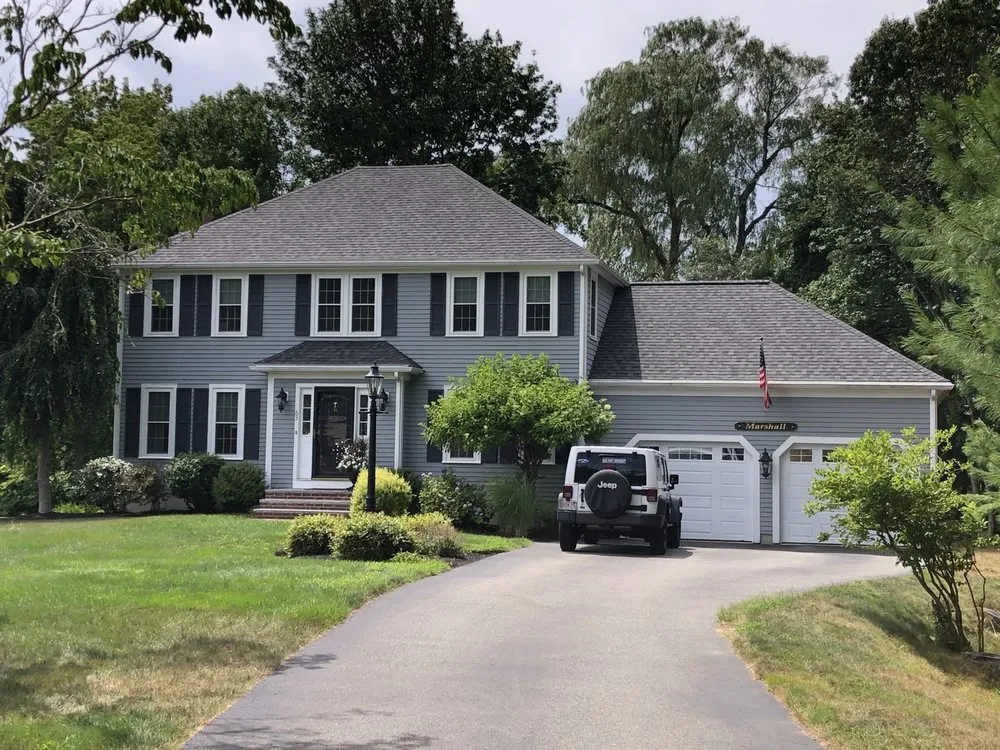 Slide of REI Roofing