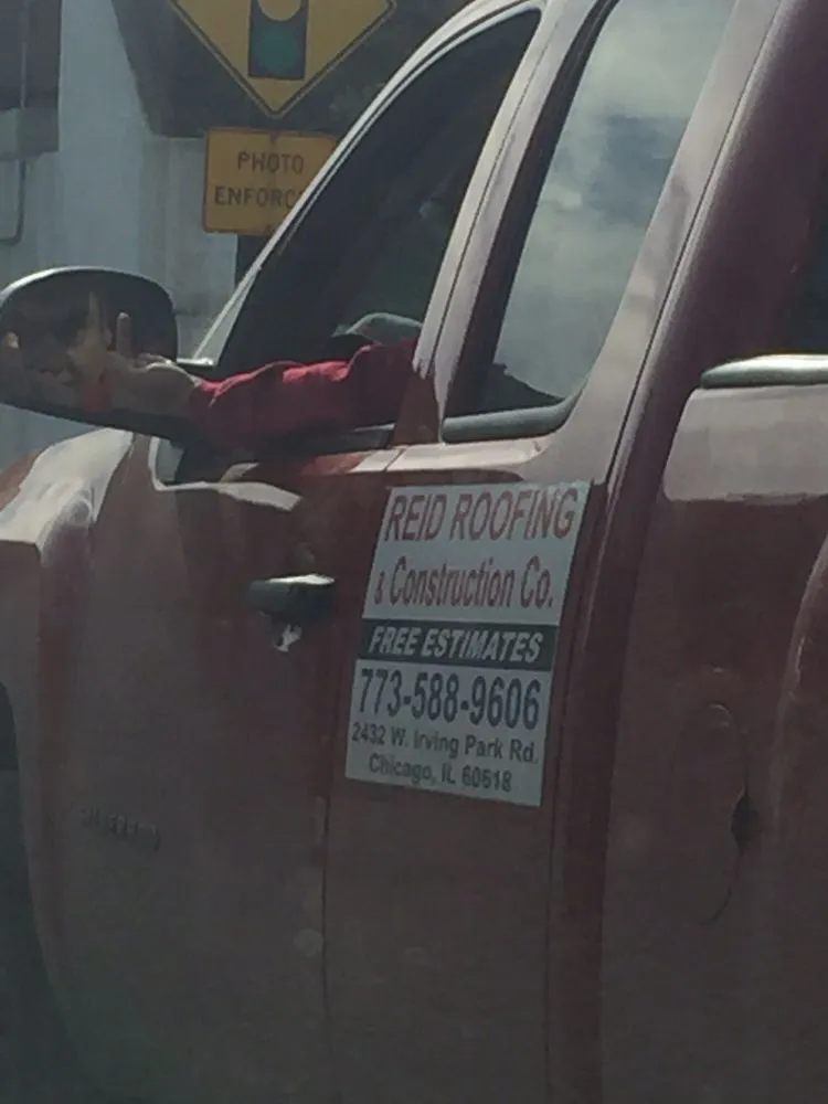 Slide of Reid Roofing