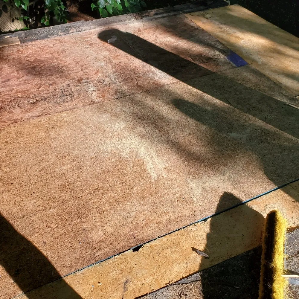 Slide of Reid's Roofing