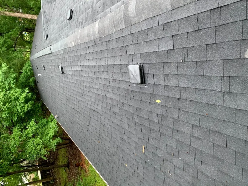 Slide of Reid's Roofing