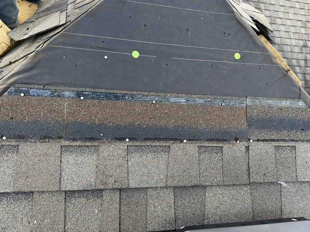 Slide of Reign Roofing