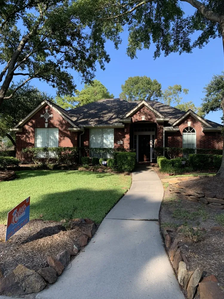Slide of Reign Roofing