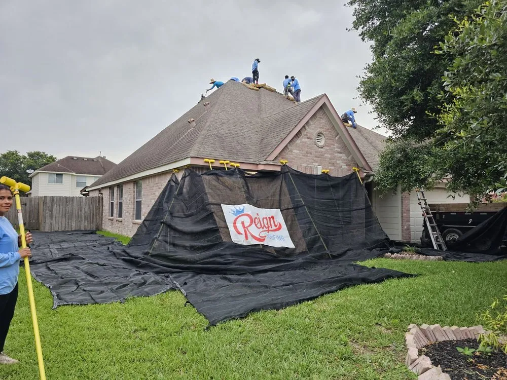 Slide of Reign Roofing