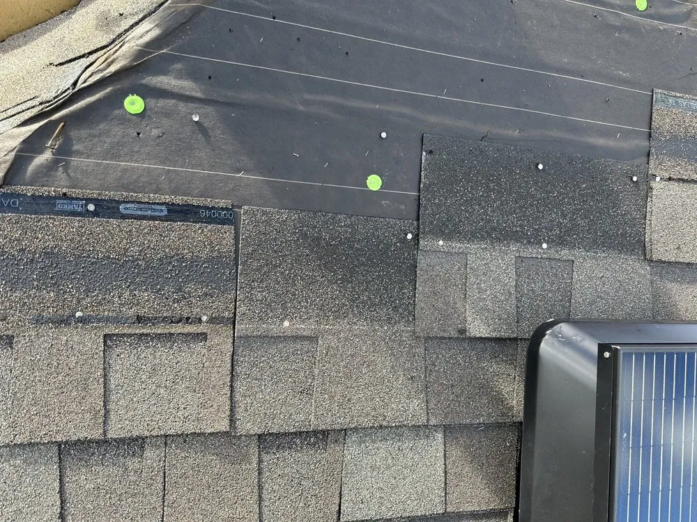 Slide of Reign Roofing