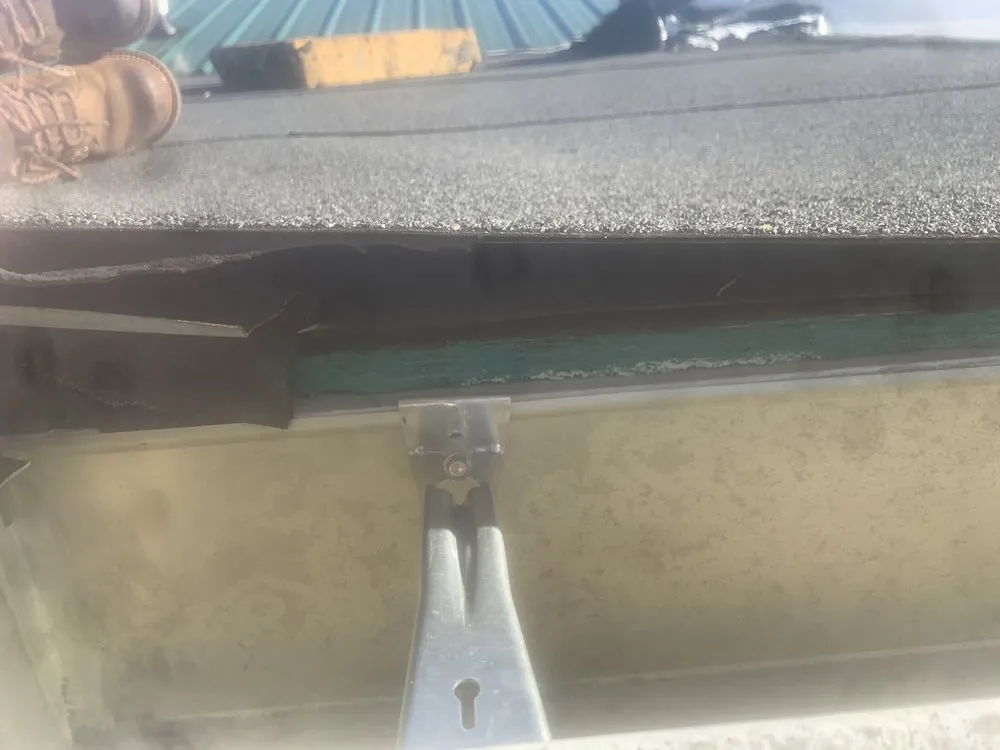 Slide of Rein’s Roofing Repair