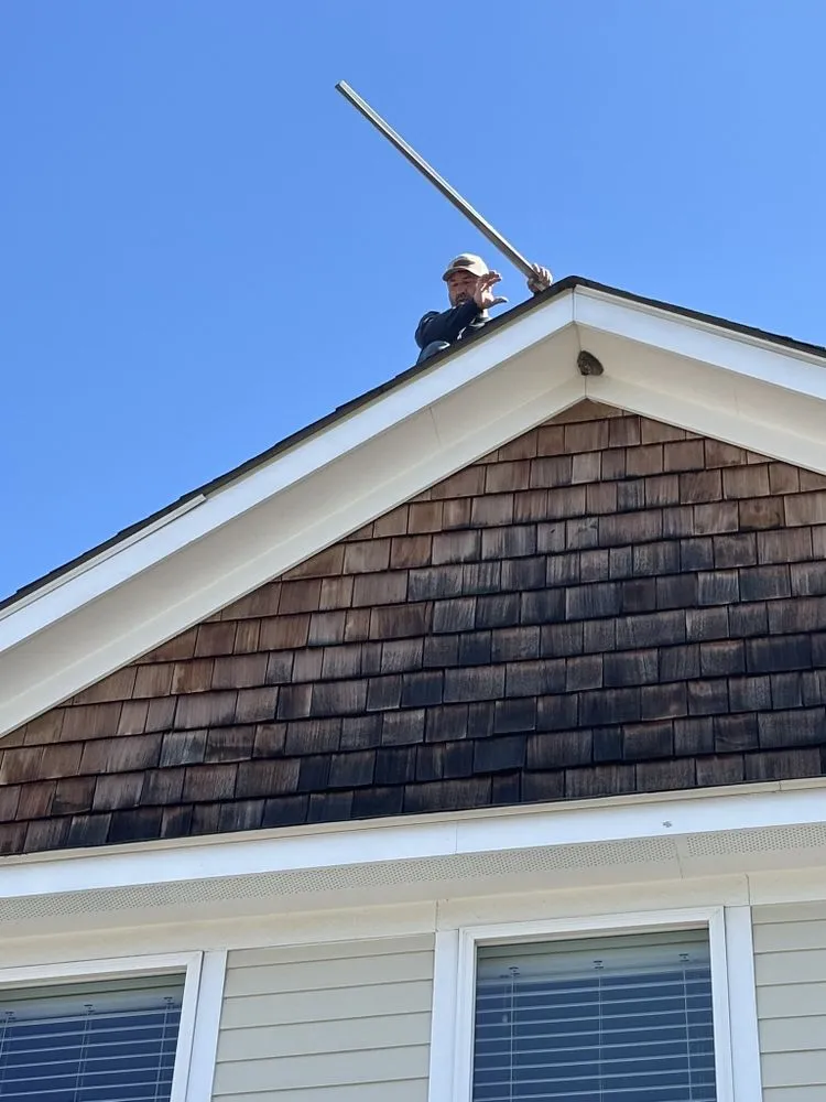 Slide of Rein’s Roofing Repair