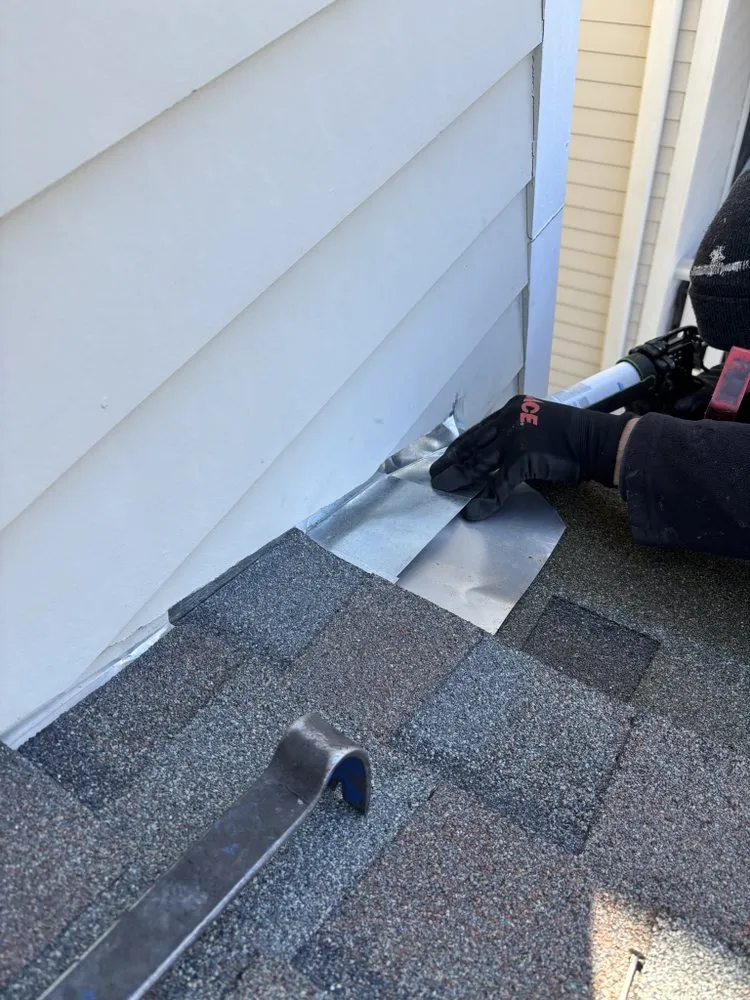 Slide of Rein’s Roofing Repair