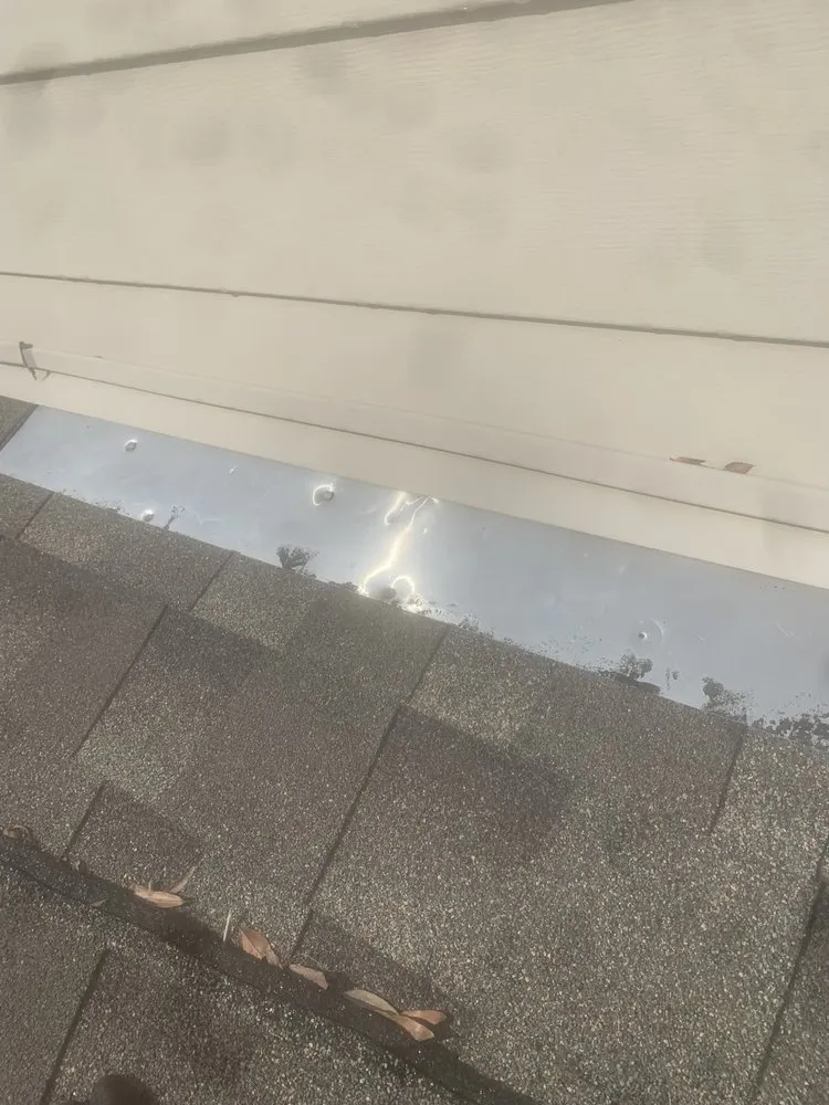 Slide of Rein’s Roofing Repair