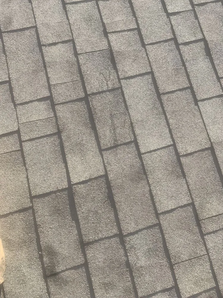 Slide of Rein’s Roofing Repair