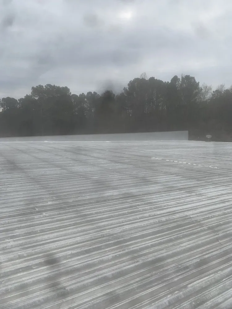 Slide of Rein’s Roofing Repair