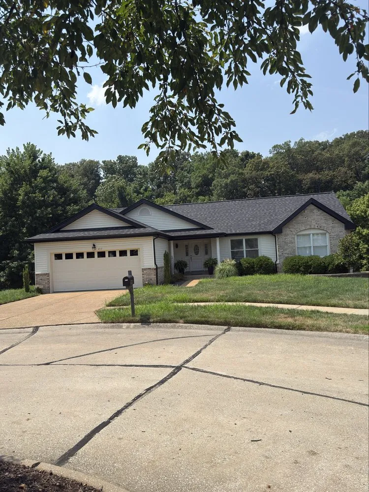 Reliable roof replacement for homes in St. Louis, MO by Reliable Construction 1