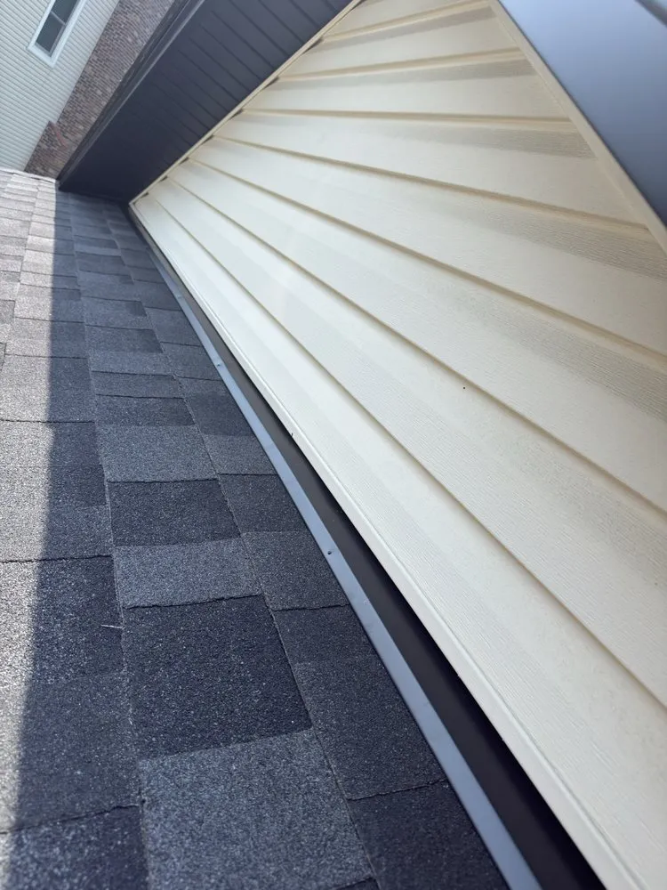 Licensed storm damage roof repair in St. Louis, MO - Reliable Construction 1