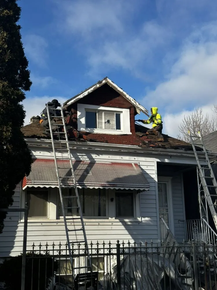 Slide of Reliable Roofers & Tuck Pointing