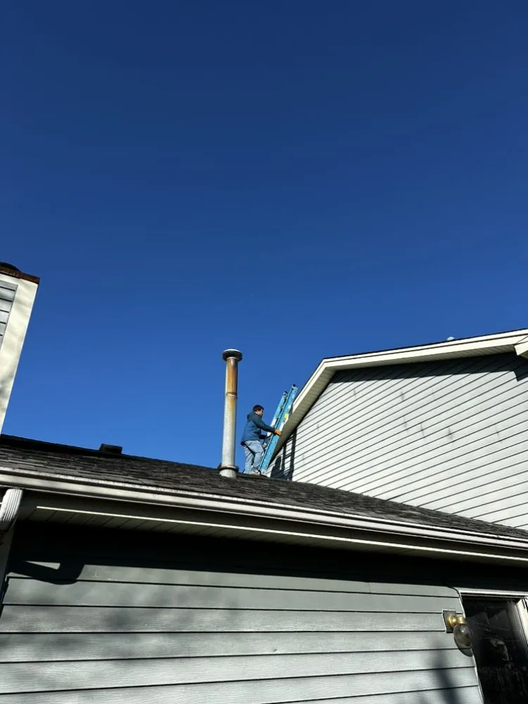 Slide of Reliable Roofers & Tuck Pointing