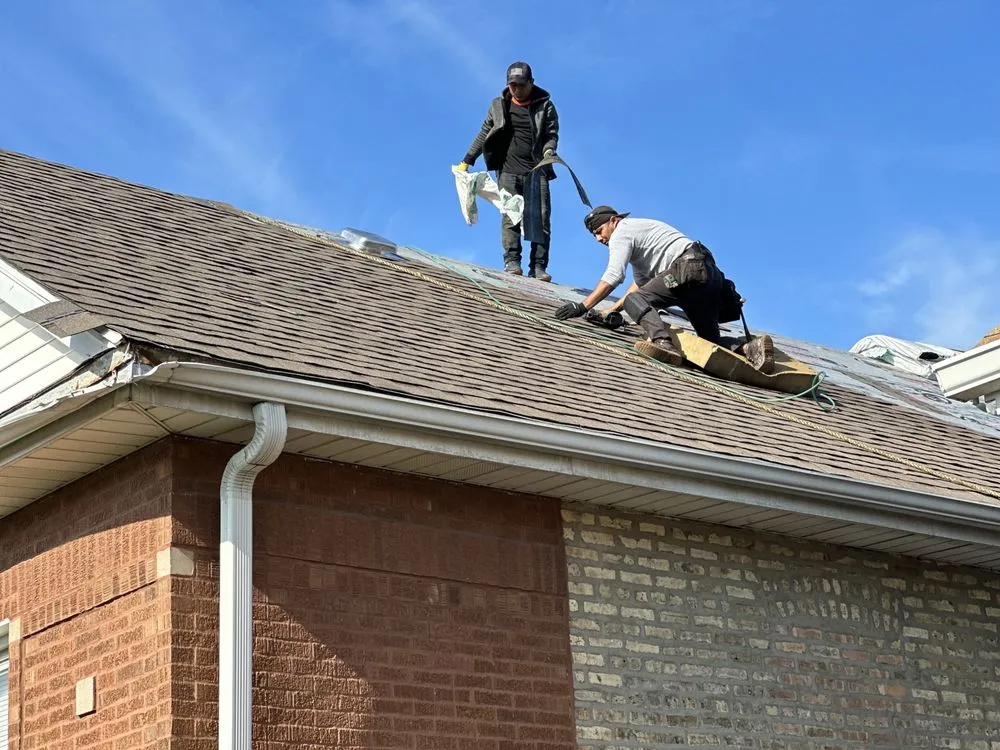 Slide of Reliable Roofers & Tuck Pointing
