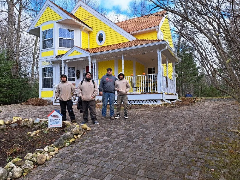 Local residential roofing service with free inspection across Buckley, MI - Reliable Roofing and Siding
