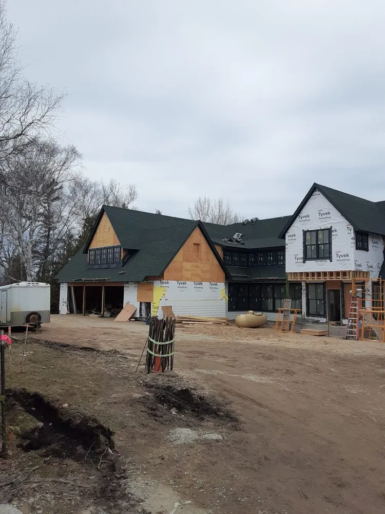Trusted storm damage roof repair experts serving Buckley, MI - Reliable Roofing and Siding