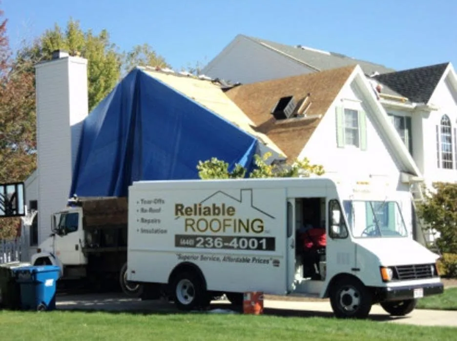Emergency storm damage roof repair in Columbia Station, OH by Reliable Roofing