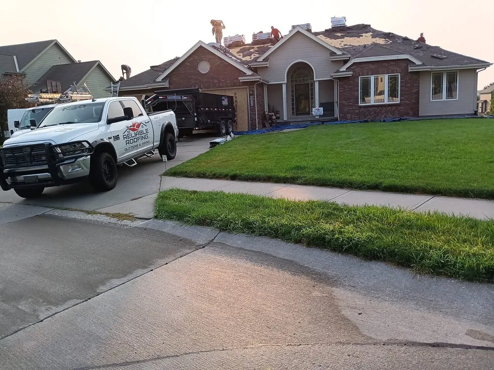 Slide of Reliable Roofing Gutters & Siding