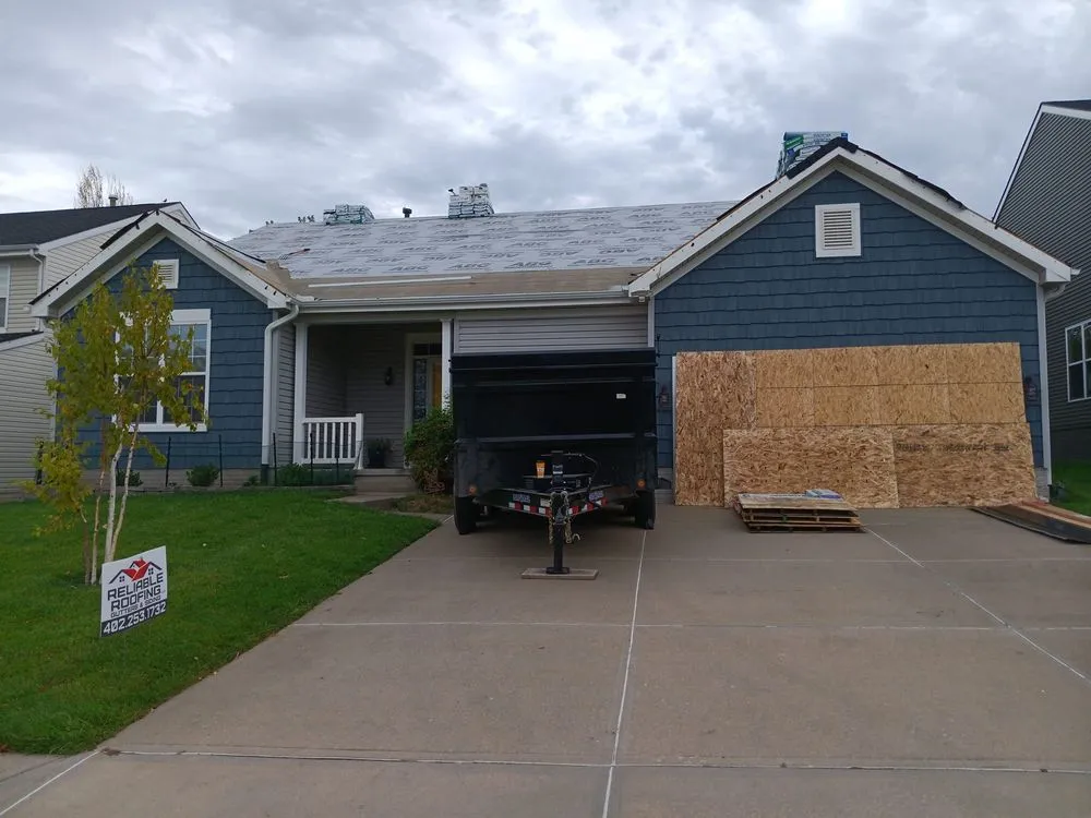 Slide of Reliable Roofing Gutters & Siding