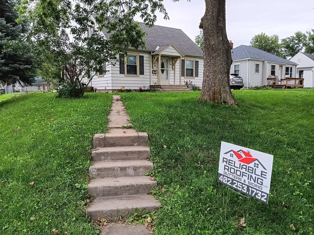 Slide of Reliable Roofing Gutters & Siding