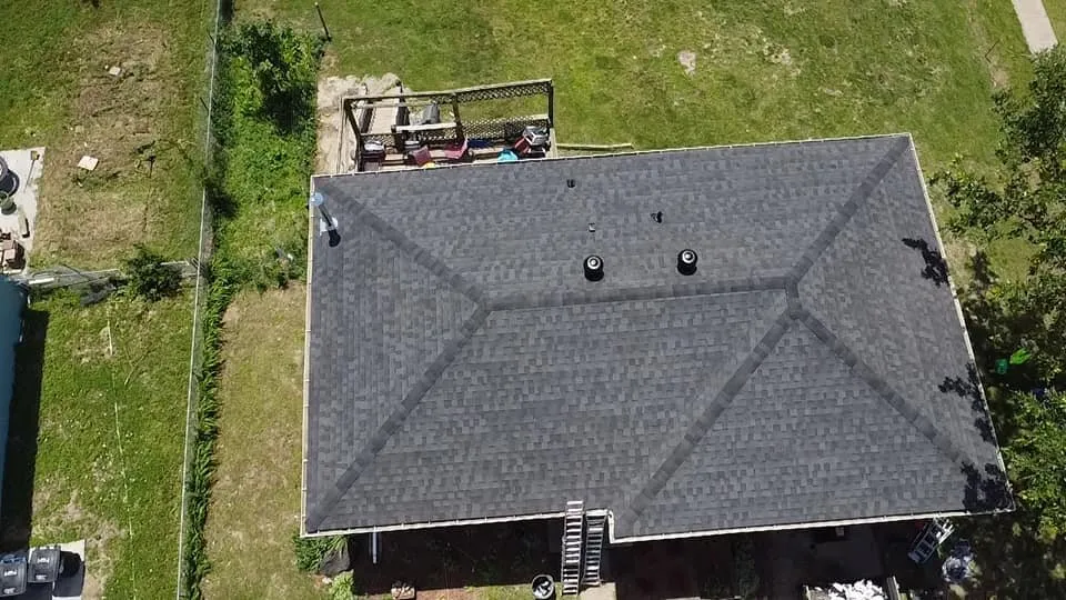 Slide of Reliable Roofing Gutters & Siding