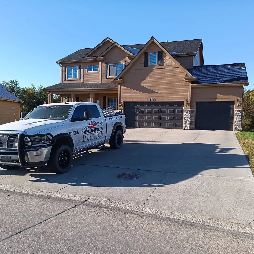 Slide of Reliable Roofing Gutters & Siding