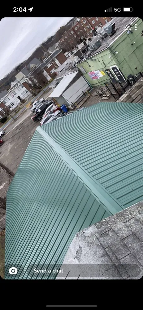 Slide of Reliable Roofing of New England