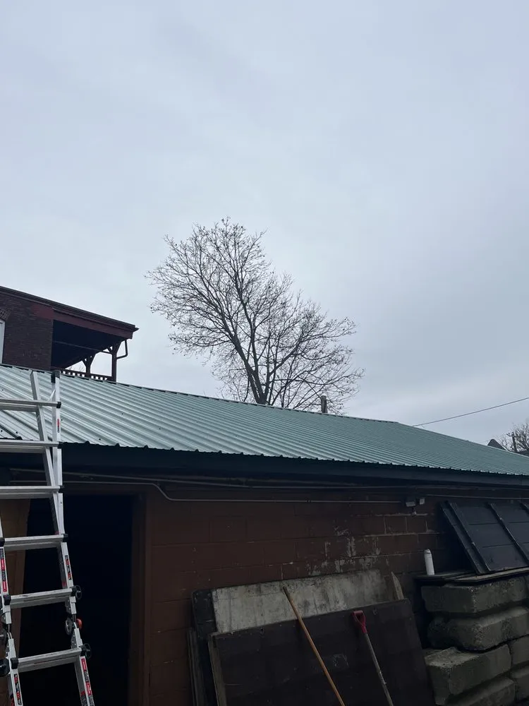 Slide of Reliable Roofing of New England