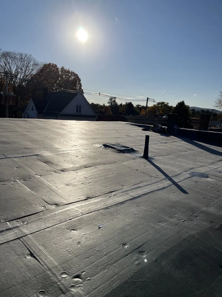 Slide of Reliable Roofing of New England