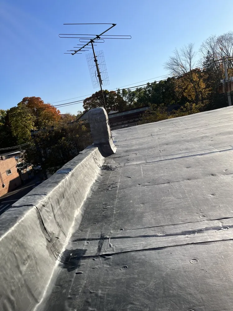 Slide of Reliable Roofing of New England