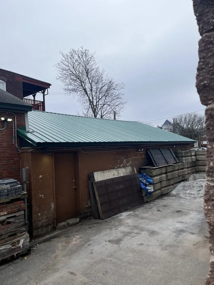 Slide of Reliable Roofing of New England