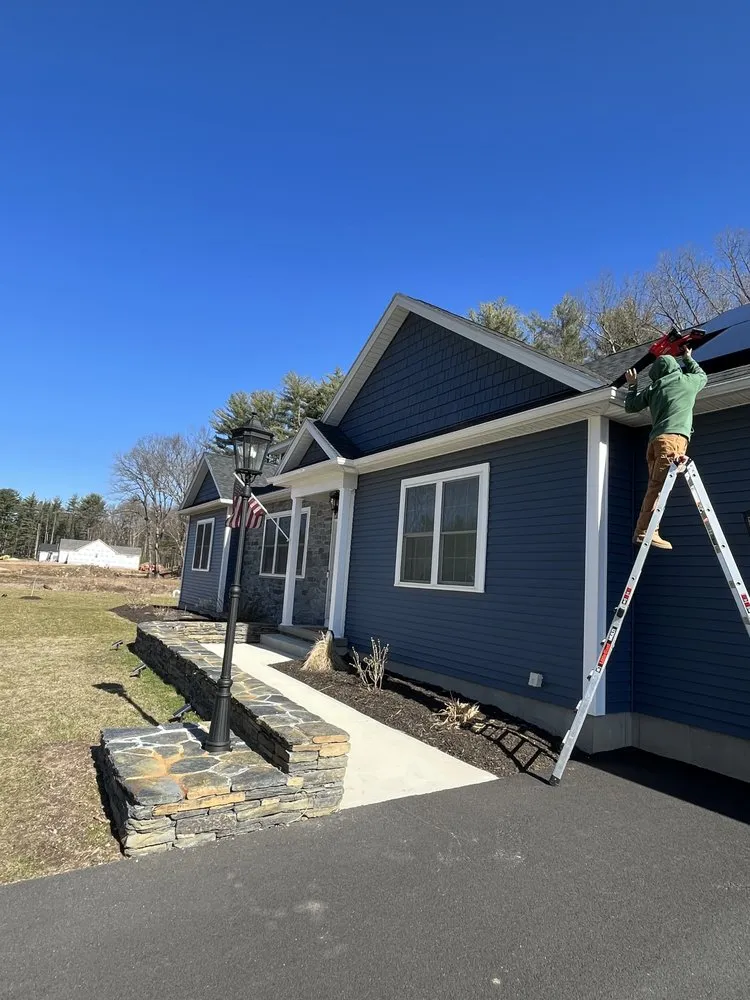 Slide of Reliable Roofing of New England