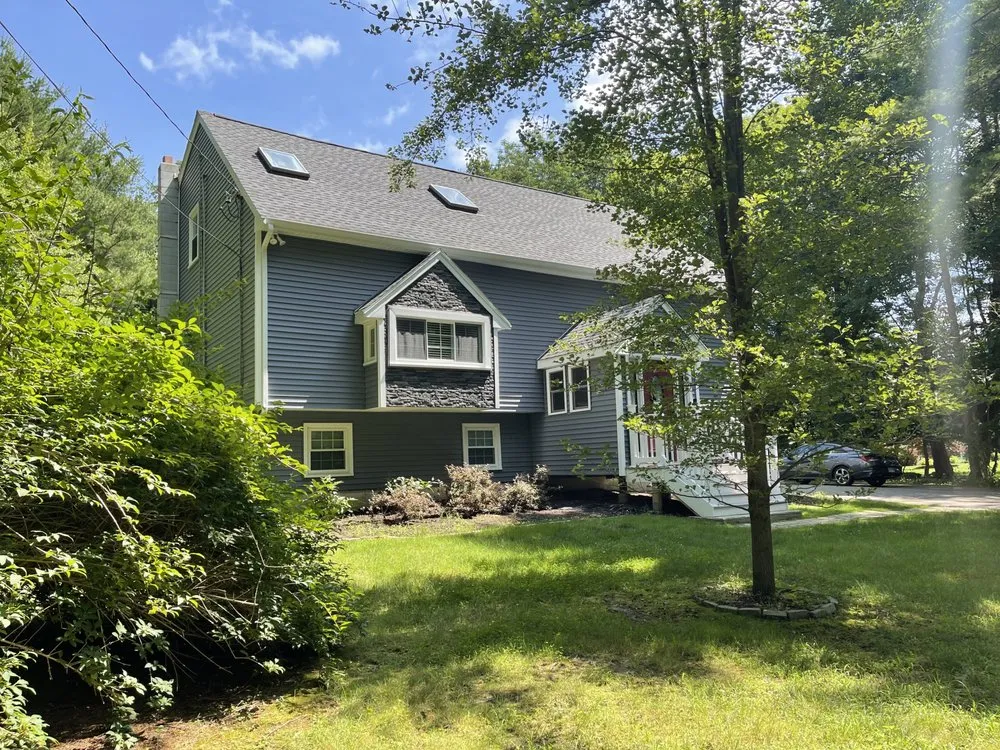 Slide of Reliable Roofing Siding and Windows