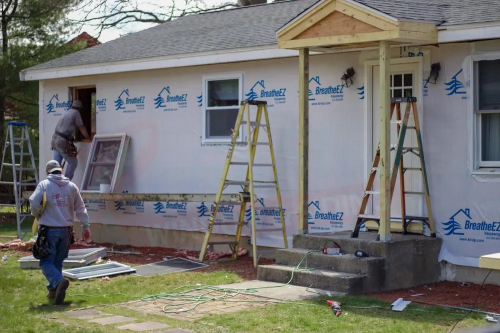 Slide of Reliable Roofing Siding and Windows