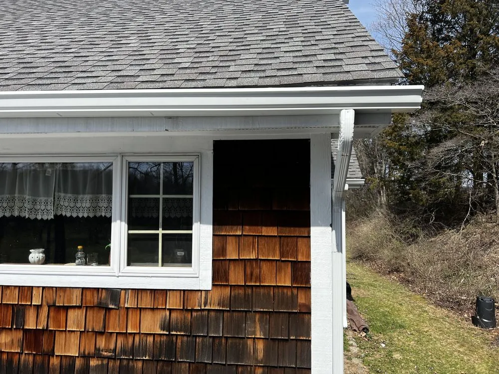 Slide of Reliable Seamless Gutters