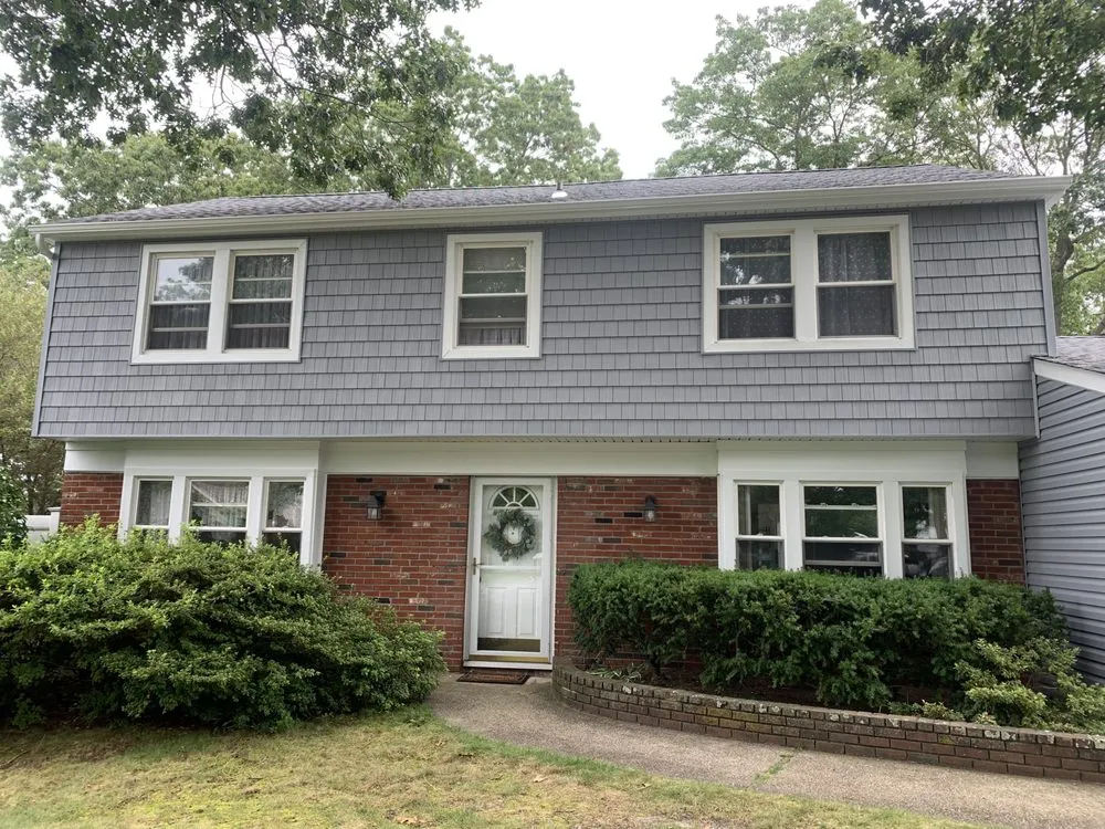 Slide of Reliance Roofing & Siding