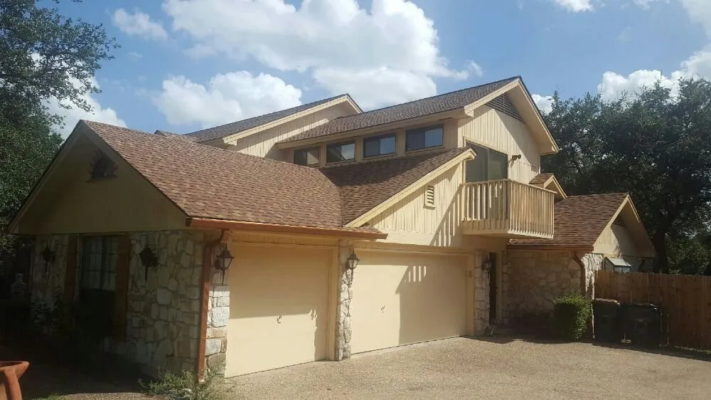 Slide of Reliance Roofing