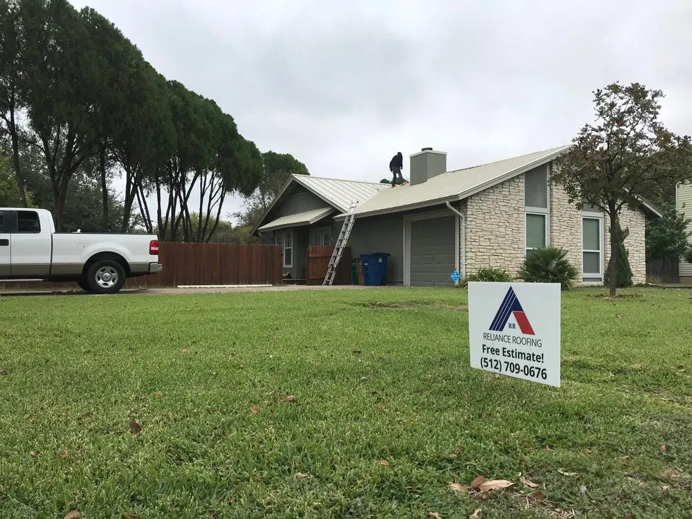 Slide of Reliance Roofing