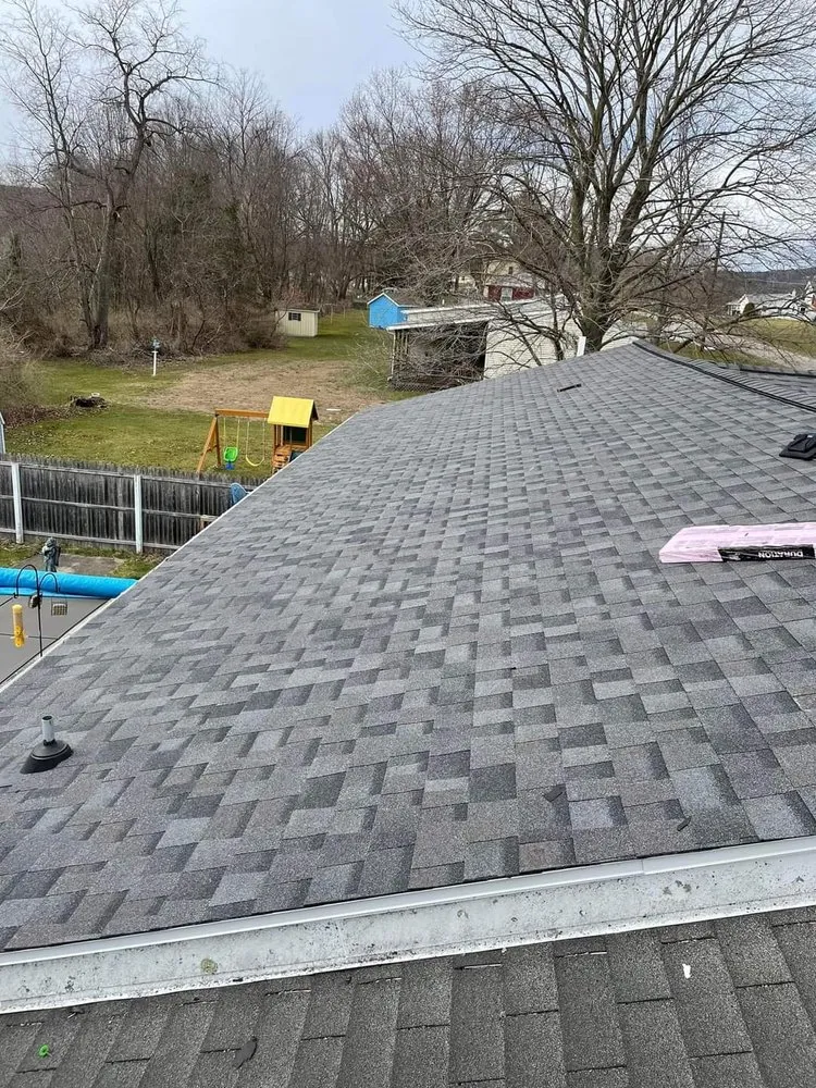 Slide of Reliance Roofing