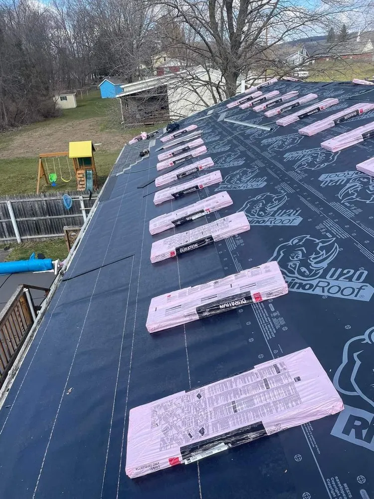 Slide of Reliance Roofing