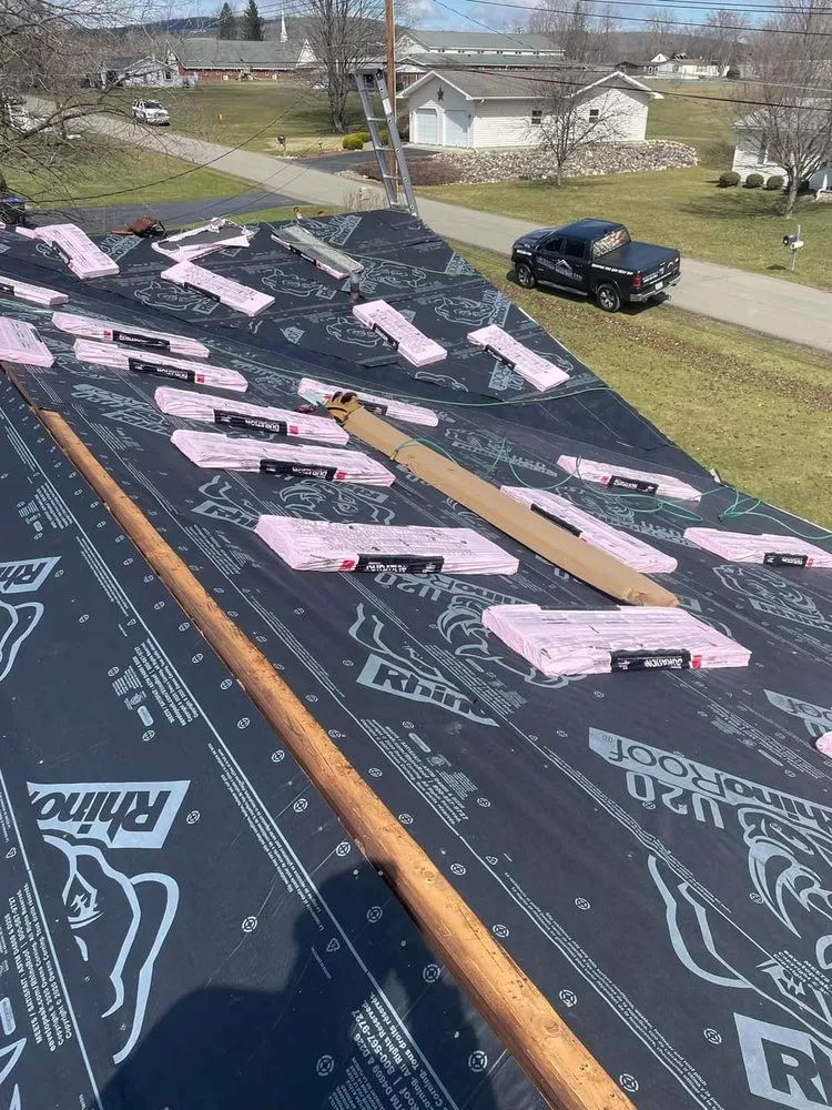 Slide of Reliance Roofing