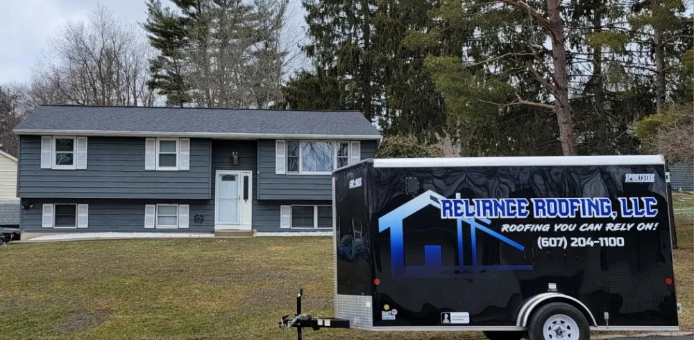 Slide of Reliance Roofing