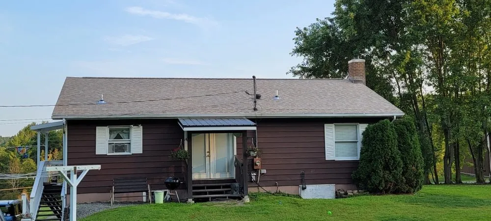 Slide of Reliance Roofing