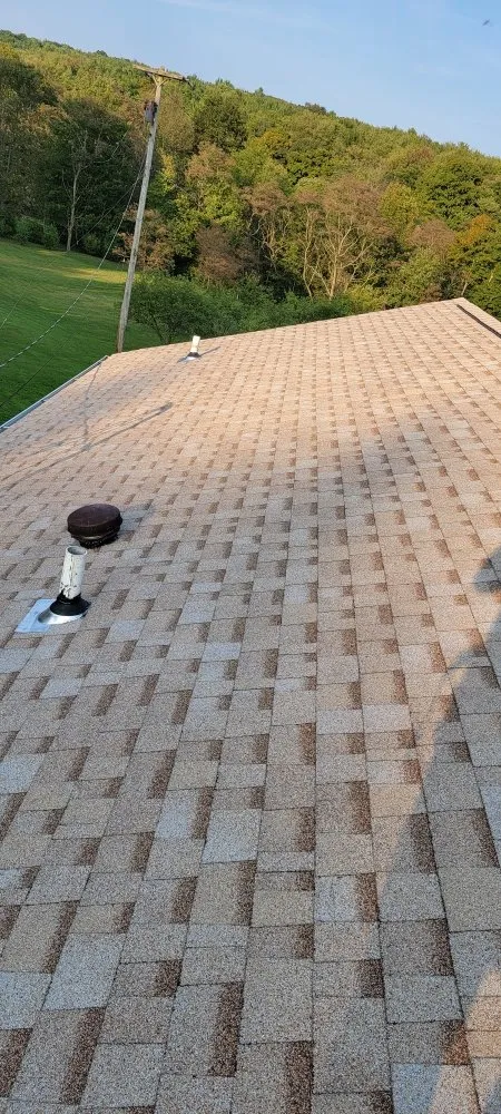 Slide of Reliance Roofing